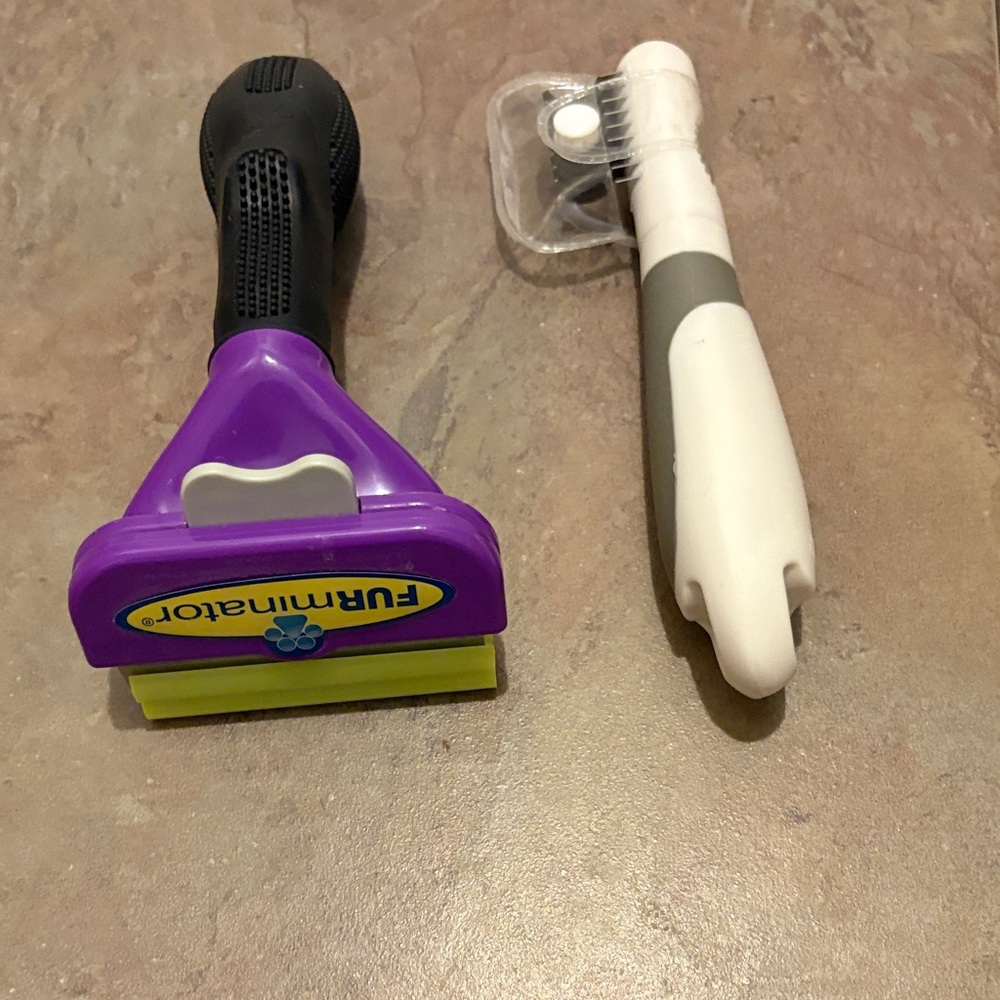FURminator Black and Purple Grooming Tool also Cat Dematter. Grooming tools.
